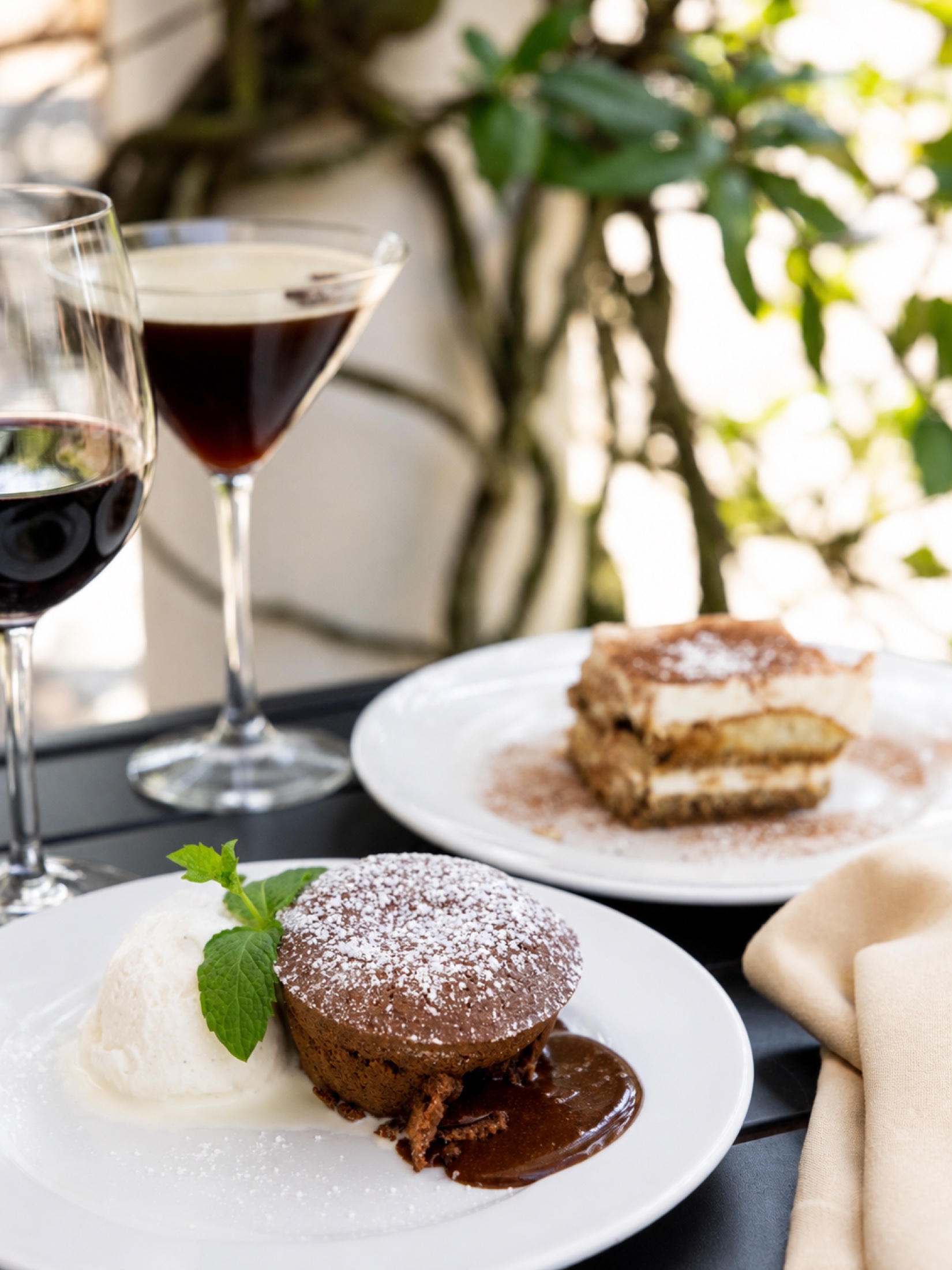 Chocolate soufflé and tiramisu in the Vinea courtyard