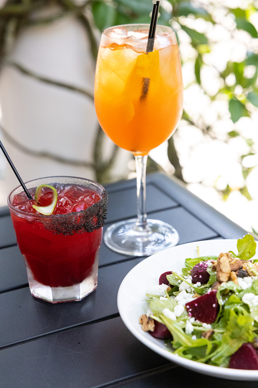 Cocktails and beet salad in the Vinea courtyard