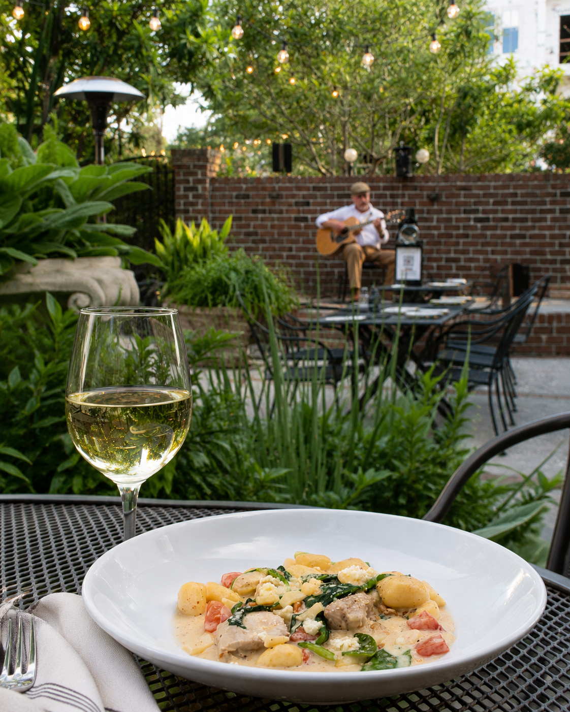 Gnocchi, wine, and live music in the courtyard