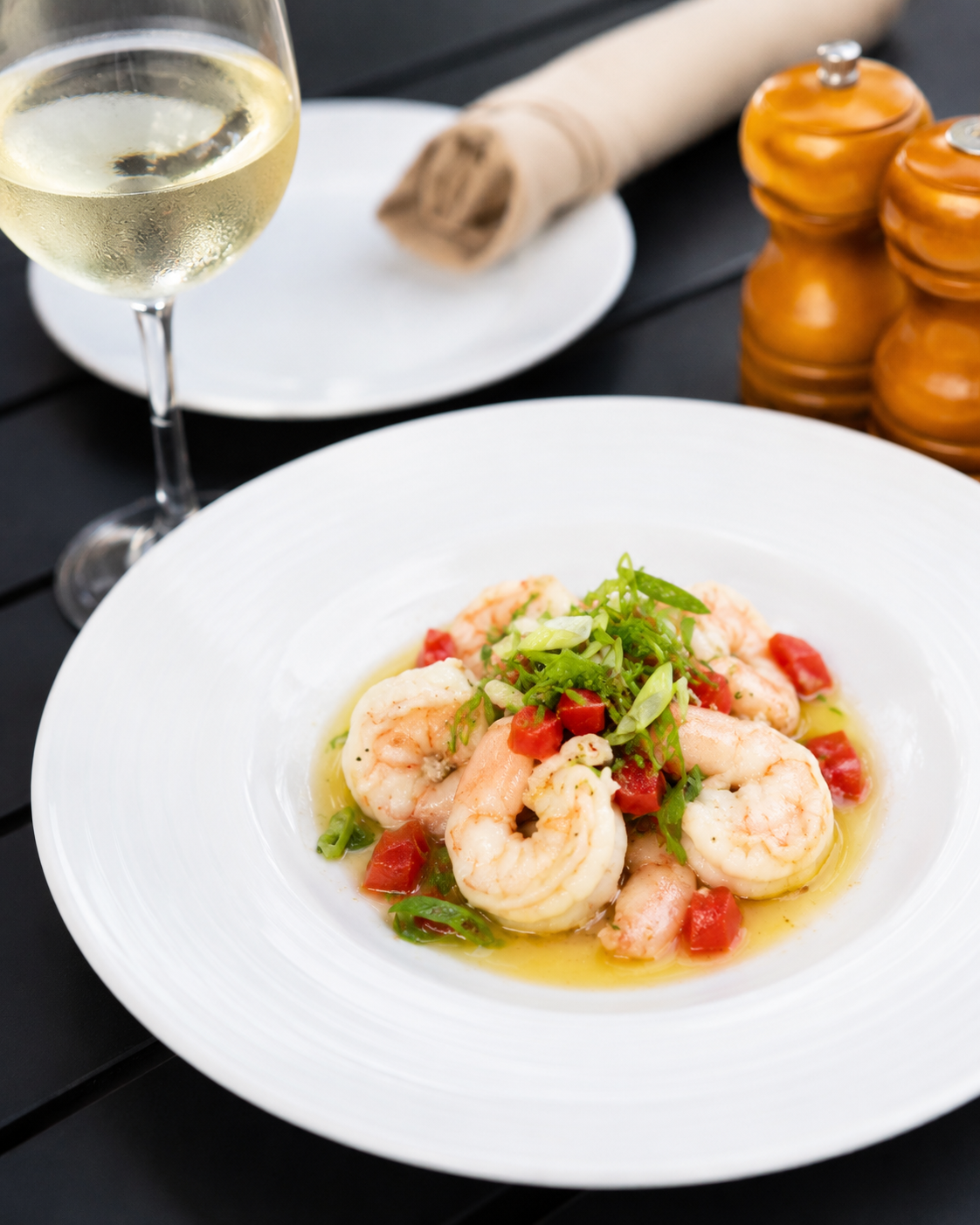 Shrimp pan with garlic, peppers, and white wine at Vinea